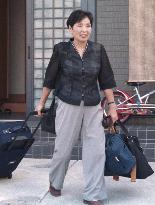 Japanese woman leaves for N. Korea to see son